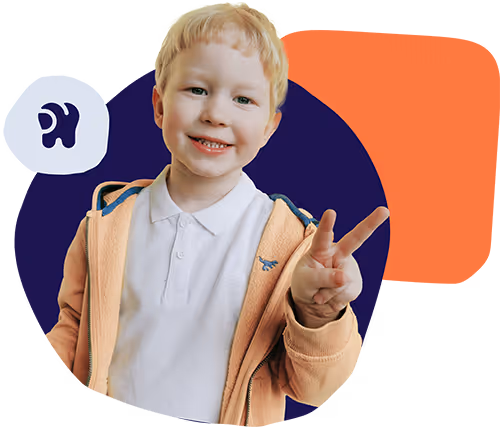 The boy shows a gesture of peace.