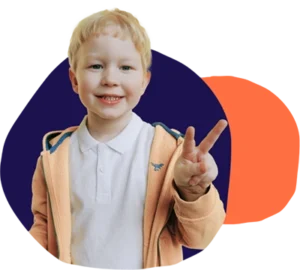 The boy shows the “peace” gesture